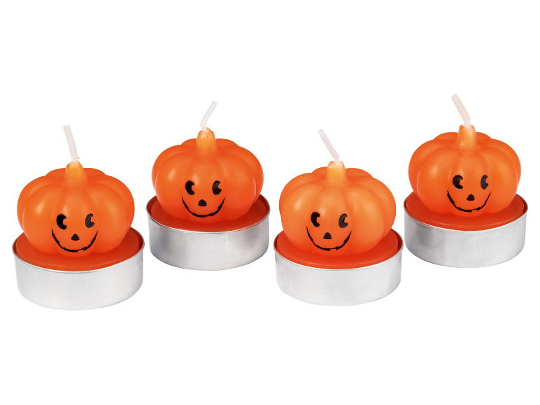 Τέσσερα κεριά ρεσό σε σχήμα κολοκύθας Halloween με χαμογελαστά πρόσωπα