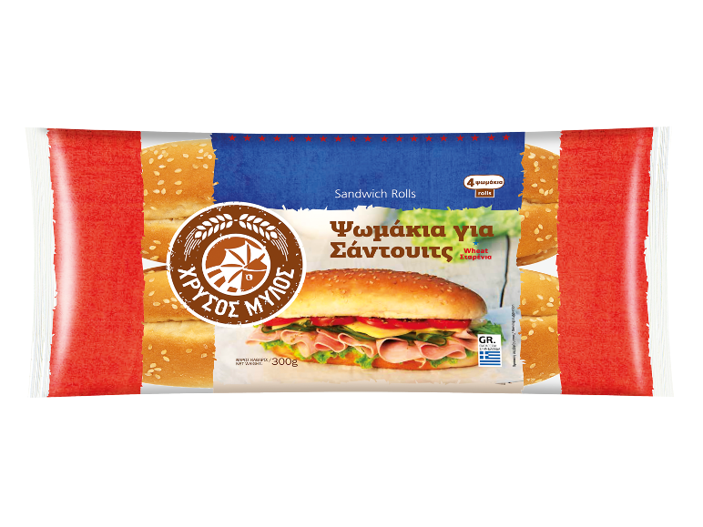 Ψωμάκια για σάντουιτς με σουσάμι, με ένα σάντουιτς με ζαμπόν και τυρί μπροστά.