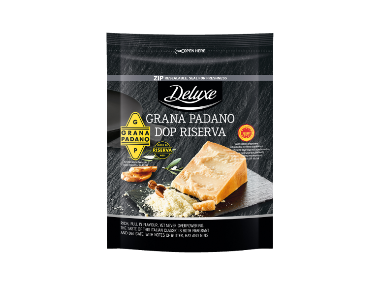 Συσκευασία τυριού Grana Padano DOP Riserva με τριμμένο τυρί και φρυγανισμένο ψωμί.