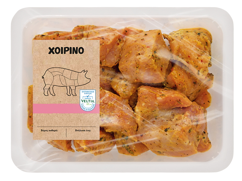 Μαριναρισμένο χοιρινό κρέας σε κενό αέρος με ετικέτα κοπής χοιρινού.