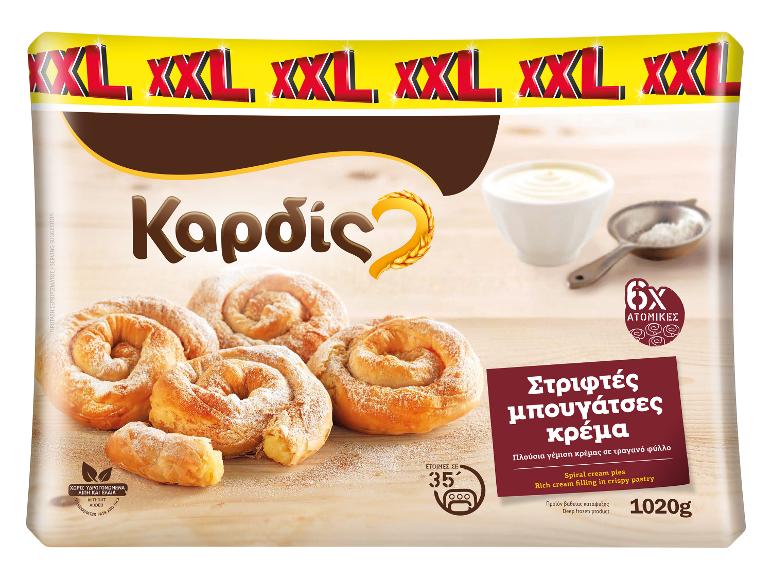 Συσκευασία έξι σπιράλ κρεμωδών πιτών, πασπαλισμένες με ζάχαρη άχνη, με ένα μπολ κρέμα.