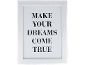 Λευκή κορνίζα με τη φράση «MAKE YOUR DREAMS COME TRUE» σε μαύρο χρώμα.